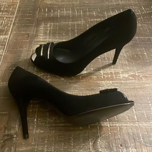 Black suede open toe Stuart Weitzman pumps.  10M